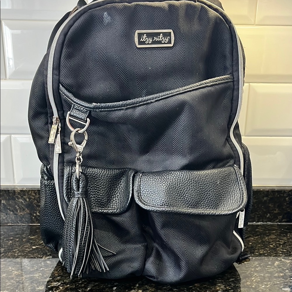Itzy Ritzy Black Backpack with Tassel